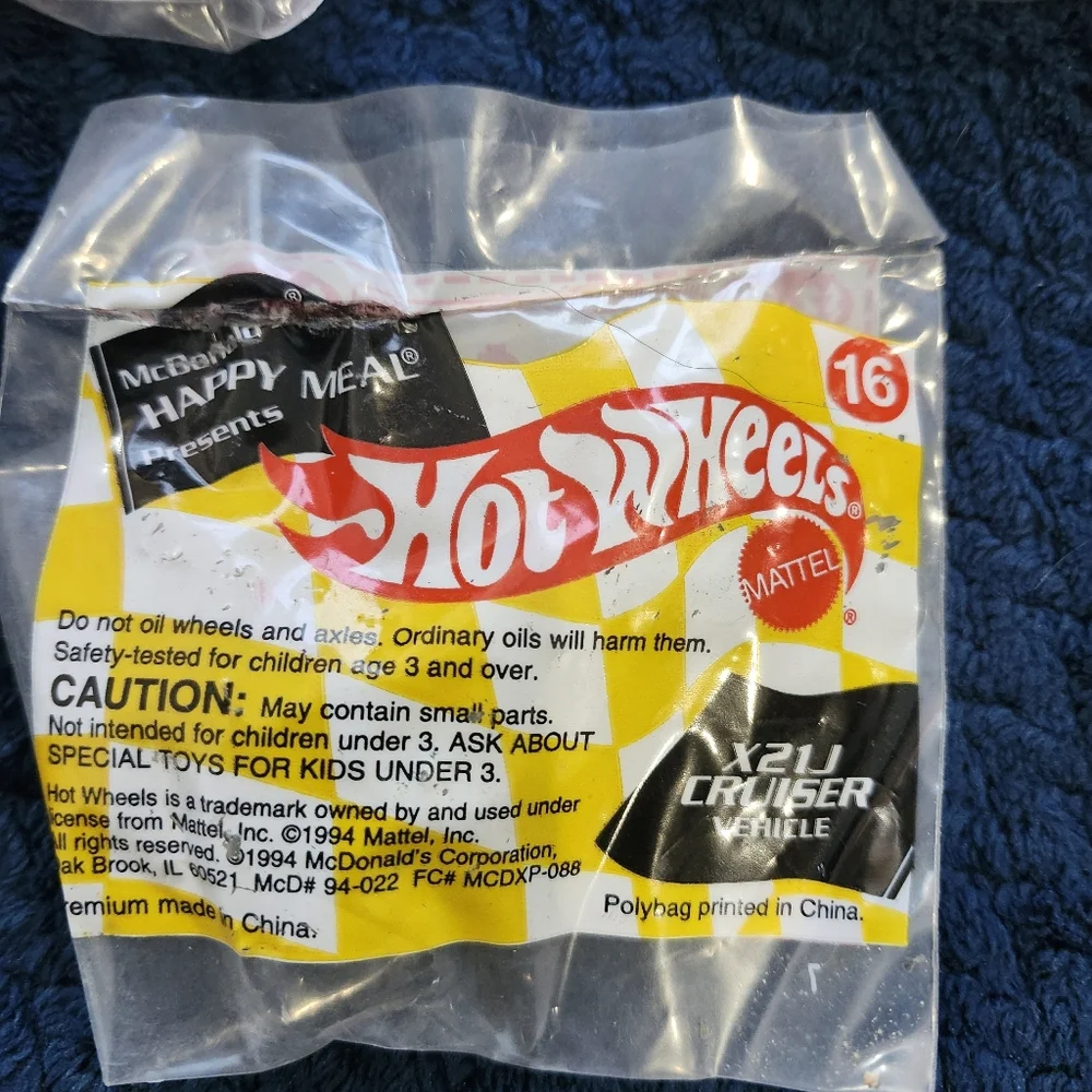 collection of three vintage 1994 McDonald's Happy Meal Hot Wheels toys